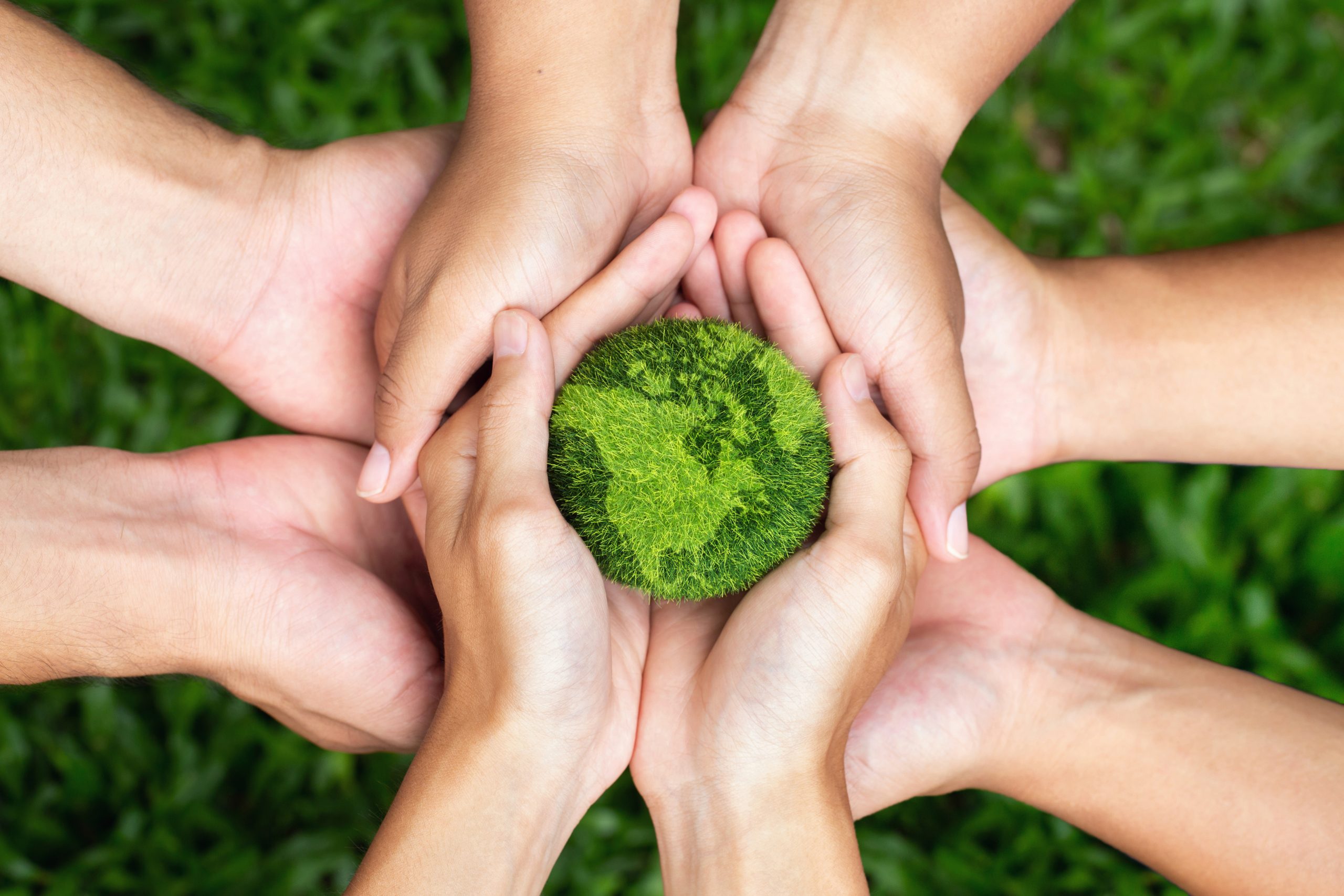 Earth Day. Hands adult Teamwork harmony Holding earth on hands.